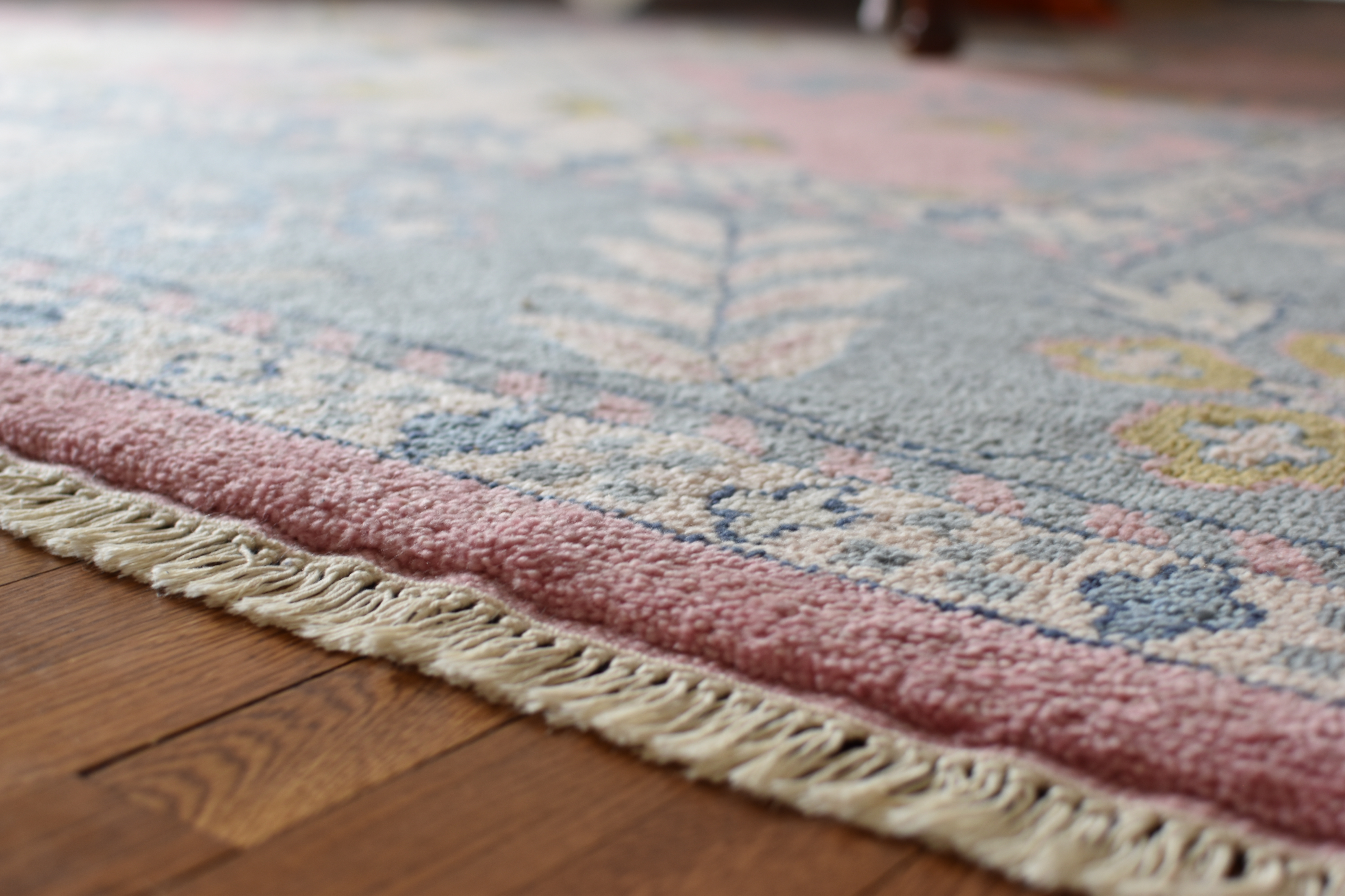 Antique rug on original hardwood floors